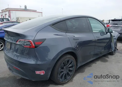 2023 Tesla Model Y Awd/Long Range Dual Motor All-Wheel Drive z USA, uszkodzony, nr VIN 7SAYGDEE5PF916715